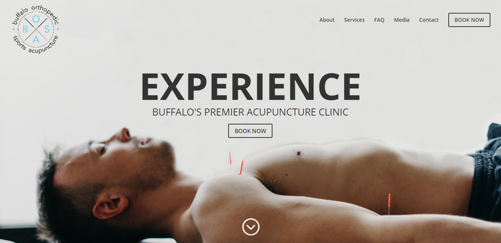 Buffalo Sports Acupuncture website landing page, with a shirtless man resting with acupuncture needles in.